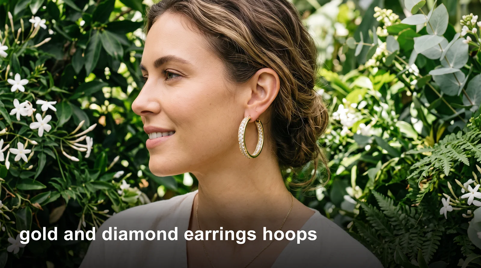 Gold diamond hoop earrings displayed in a jewelry box, showcasing sparkle and pavé detail on the hoops