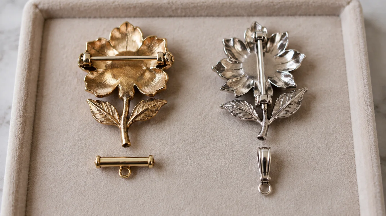 Two brooch backs with horizontal and vertical pin stems beside matching converter types