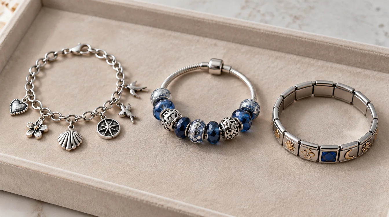Three charm bracelet styles with dangling ornaments, slide on beads, and flat modular links on one tray.